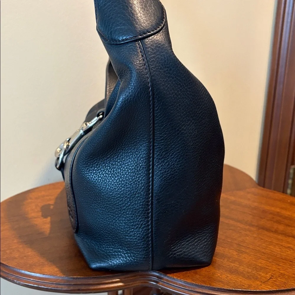 Dooney & Bourke Vintage shoulder bag leather  black  Silvertone clip front style